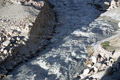 25 Wire Pulley System And Small Wooden Box Hanging From A Steel Cable Can Be Used To Cross Raging Braldu River Near Paiju.jpg